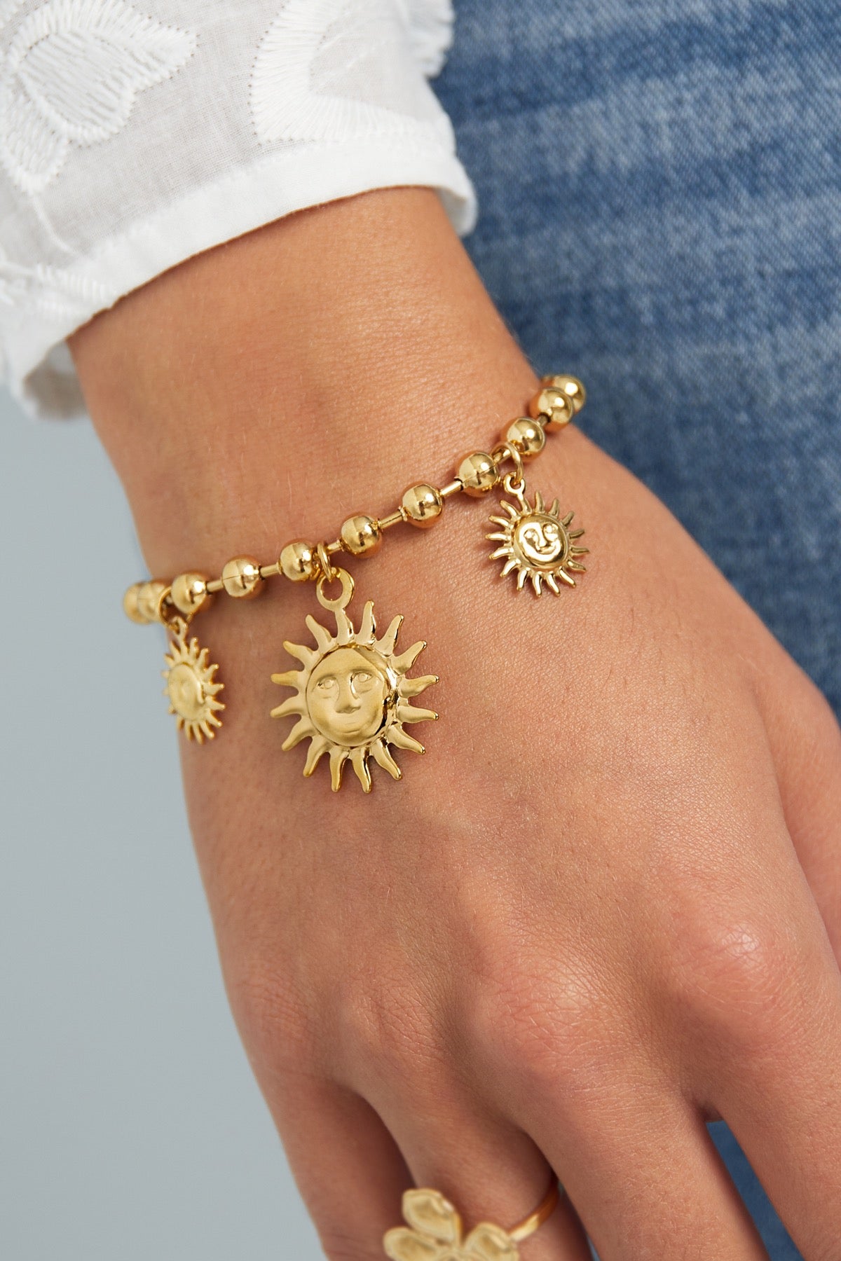 ARMBAND SUN CHARM GOUD