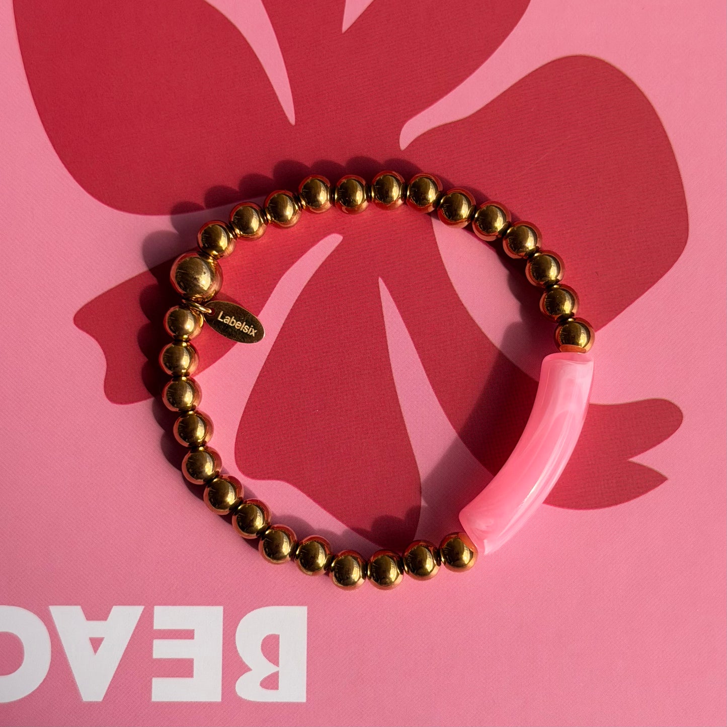 ARMBAND PINK TUBE - LABEL SIX