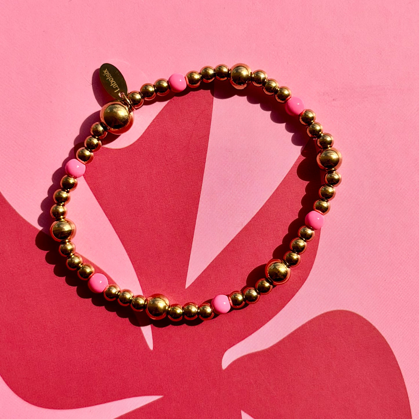 ARMBAND PINK DOTS - LABEL SIX
